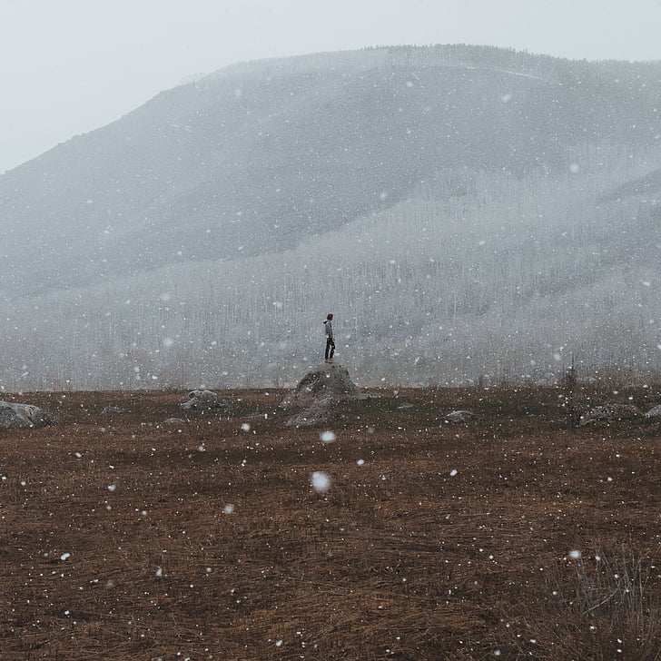 person, standing, gray, hill, winter, overlooking, mountain