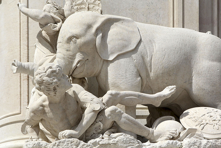 Słoń, Lizbona, posąg, a kois karmienia kaczek