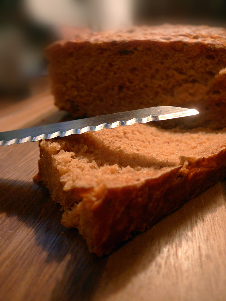 bread, cutting board, knife