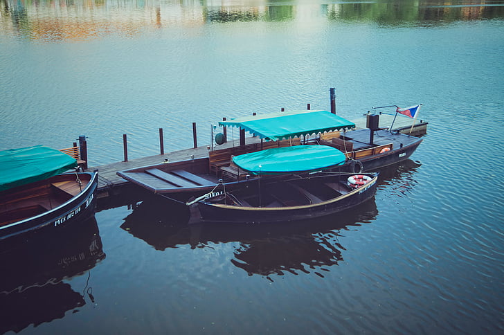 two, black, blue, wooden, boats, near, dock