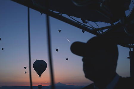 hot air balloons, sunset, dusk, sky, guy, man, hat