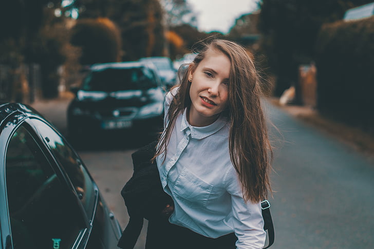 car, girl, person, road, street, vehicle, woman
