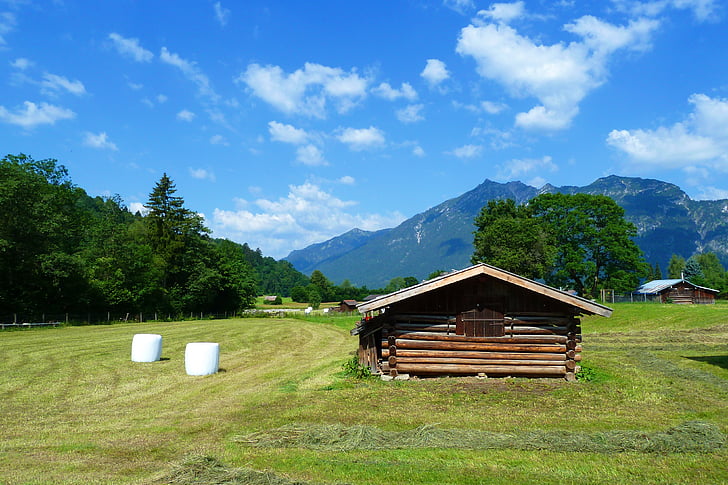 field, hay balls, log building, shed, mountains, alp, garmisch partenkirchen