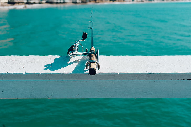 close, photo, fishing, rod, white, railing, pier