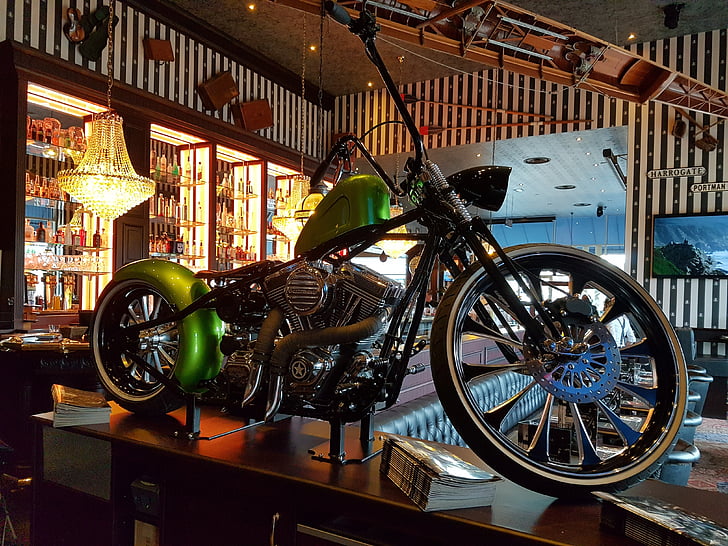 motorcycle, interior, restaurant, wheel, light, stripes, green