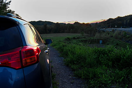 automotive, car, grass, road, sky, sunrise, sunset