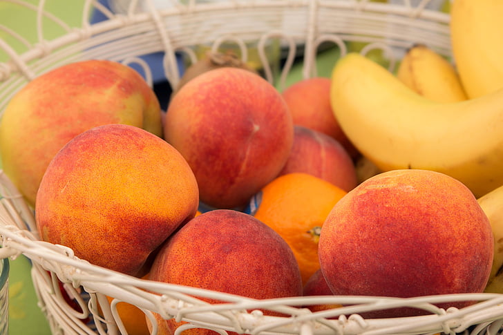 peaches, fruit, fruit basket, bananas, apple, oranges, juicy