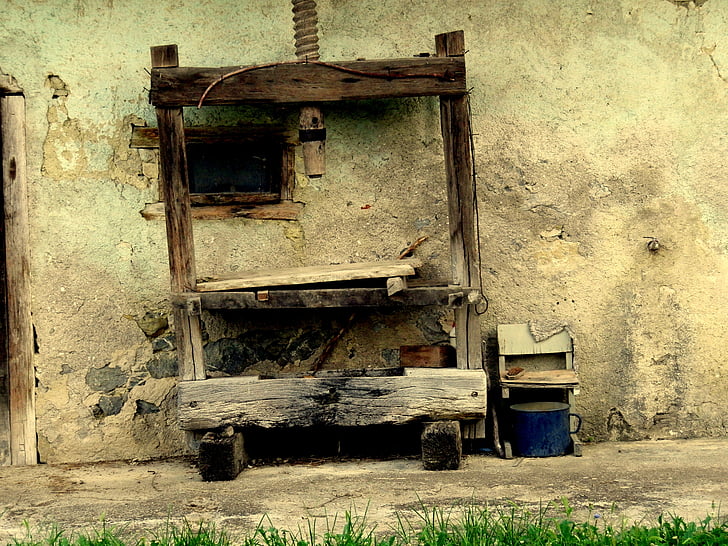 wine press, metal bucket, old wood