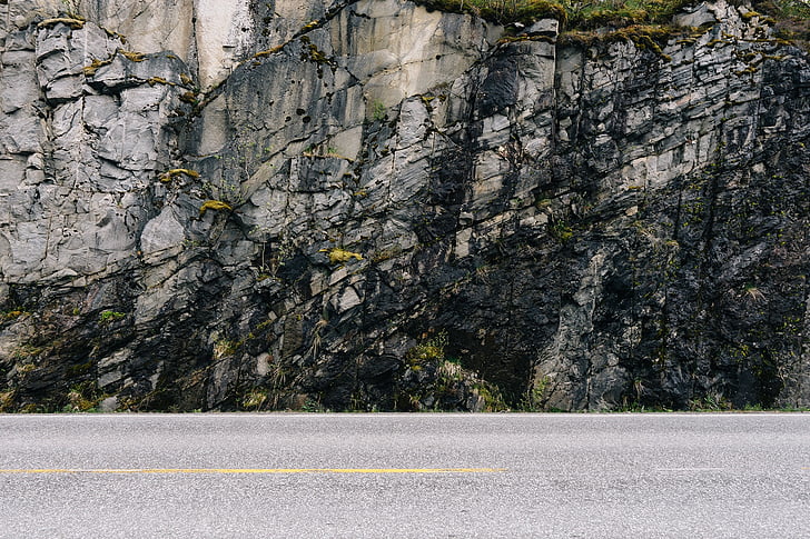 road, pavement, rocks, cliff