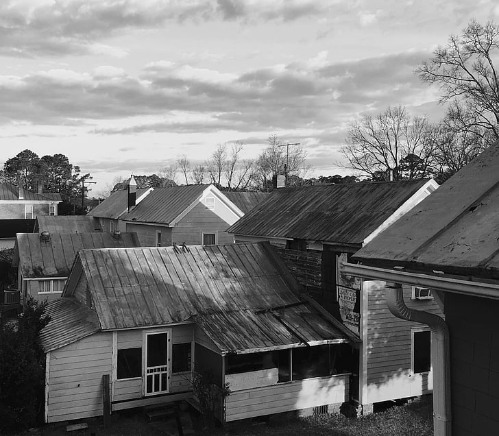 rooflines, black and white, sky, tin roof