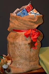 bolso del yute, Nicolás, regalos, decoración de la Navidad, llegada