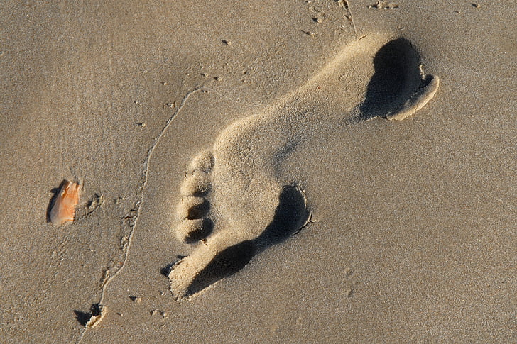 voetafdruk, sporen in het zand, zand