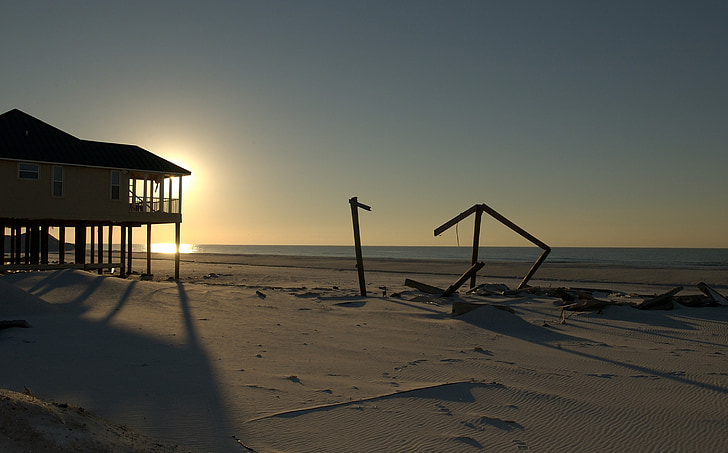 Praia de Pensacola, Florida, pôr do sol, furacão, danos, mar, oceano