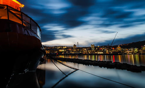 boat, buildings, city, city lights, clouds, night, reflection