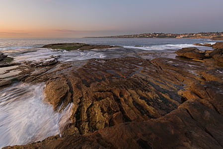 paysage marin, Sydney, Australie, lever du soleil, roches, réflexion, orange