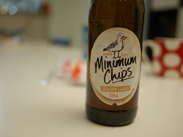 beer, minimum chips, closeup, background blur, casual, hangout, lifestyle