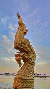 Statua del drago, serpente, collasso economico del drago
