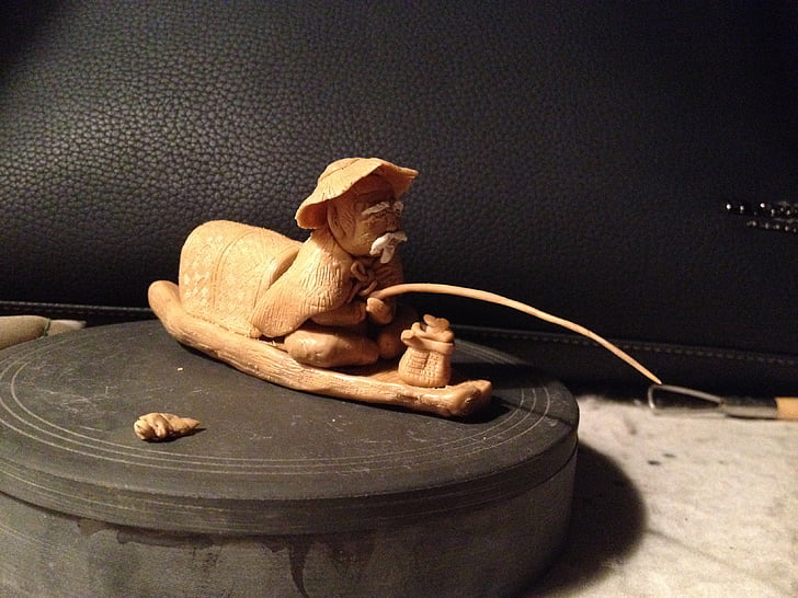 sculpture en argile, Fisher, figurine d’argile