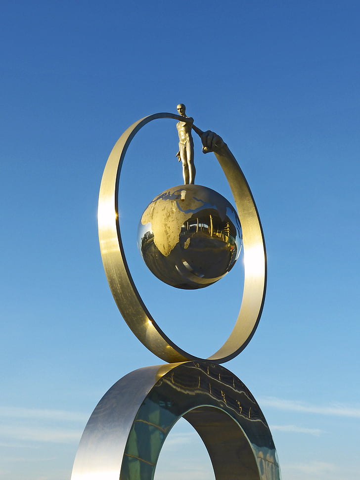 globe, finger, sculpture, circle, pointing, blue sky, gold