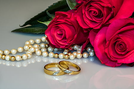 wedding rings, rings, gold rings, roses, pearl necklace, string pearl necklace, togetherness