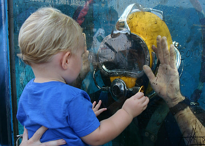 toddler, scuba diver, glass tank, cute, fun, face to face, close up