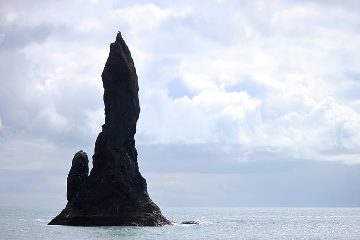 sea stack, sea, cliff, stone, iceland, showers, cloud - sky