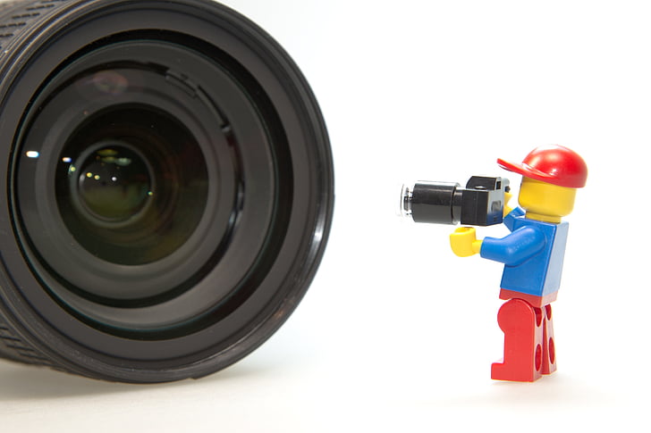 blue, red, minifig, holding, camera, facing, towards