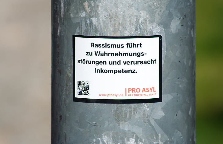 city, sticker, protest, human, per, asylum, racism