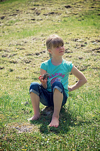 human, child, girl, with detent, sitting, meadow, nature