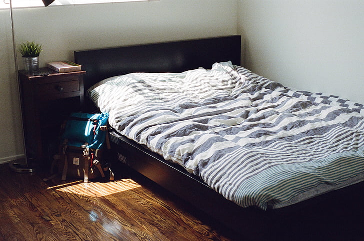 black, wooden, bed, frame, white, gray, bedspread