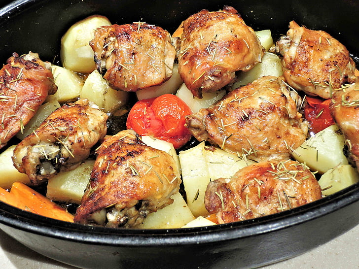 roasted chicken thighs, potatoes, carrots, tomatoes, olive oil, garlic, food