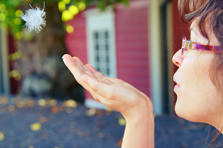 girl, feather, blowing, wish, woman, romantic, porvoo