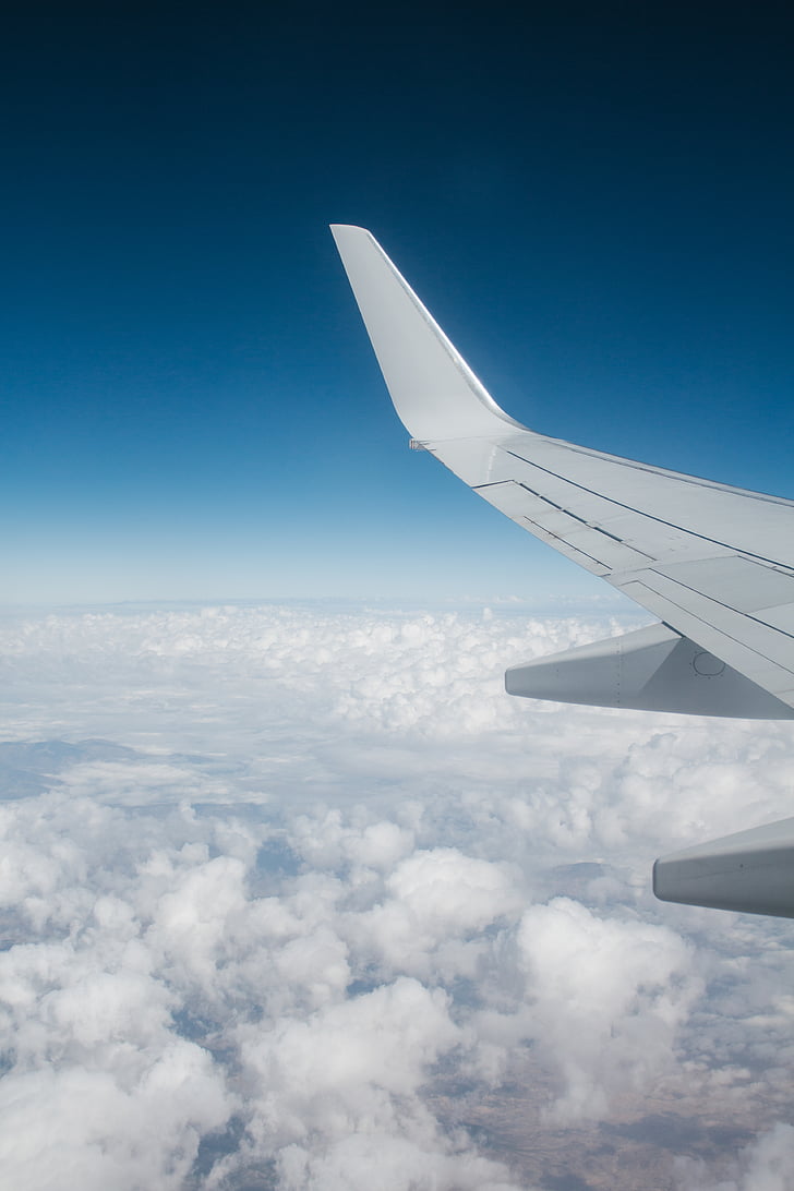 aeroplane, aircraft, aircraft wing, airplane, aviation, clouds, flight