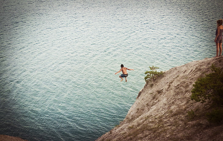 person, jumped, brown, hill, calm, body, water