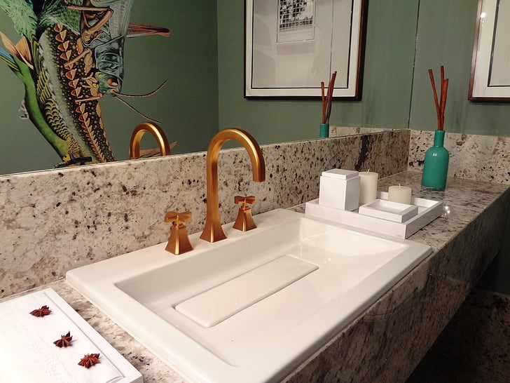 Copper Tap And And A Lot Of Aromatics In Cool Looking Bathroom