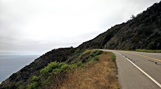 gray, road, near, cliff, bod, water, highway