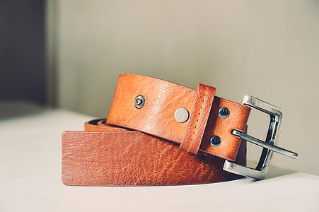 selective, focus, photo, brown, leather, belt, white