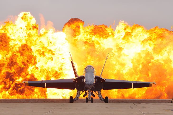 air show pyrotechnics, military jet, f-18, hornet, blue angel, flightline, detonation