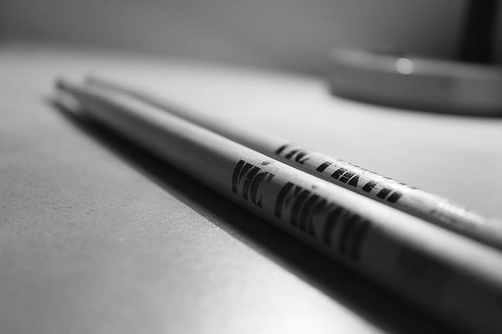 black-and-white, close-up, depth of field, drumsticks, wood