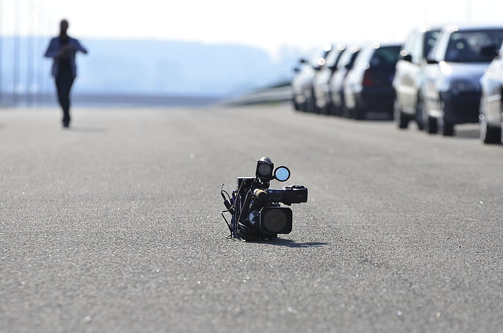 camera, close-up, macro, person, road, video camera, outdoors
