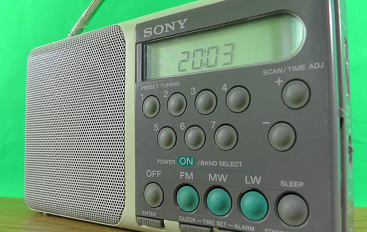 radio, small, green background, antenna, buttons, setting, loud speaker