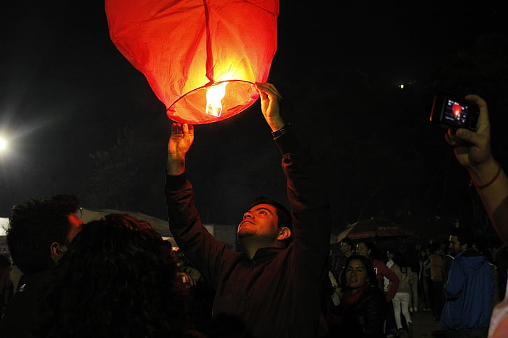 fire, lantern, dark, night, people, crowd, spectators