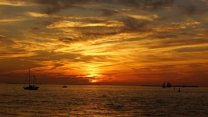 sunset, ocean, sailboats, horizon, shore, silhouettes, clouds