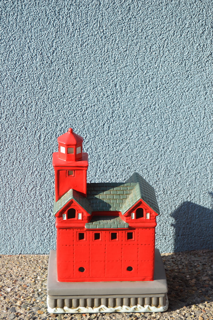 lighthouse statue, red lighthouse, lighthouse, landmark