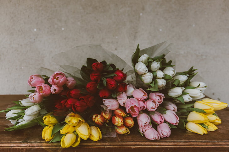assorted, colors, flowers, bouquets, table, near, wall