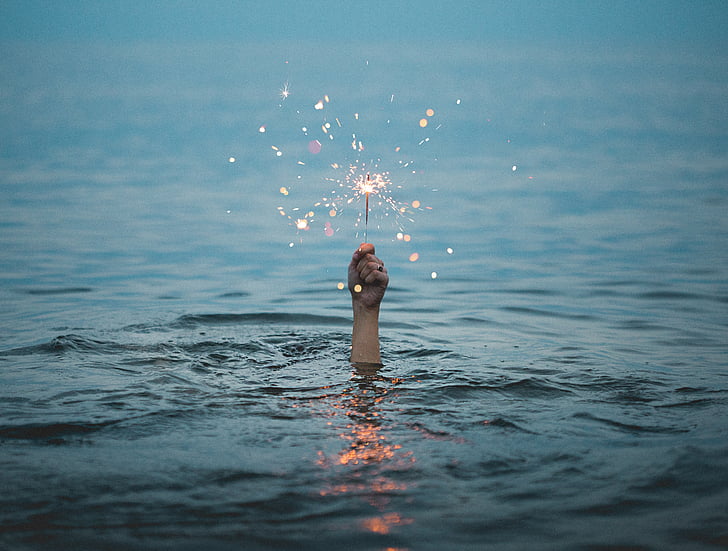 selective, focus, photography, human, hand, holding, sparkler