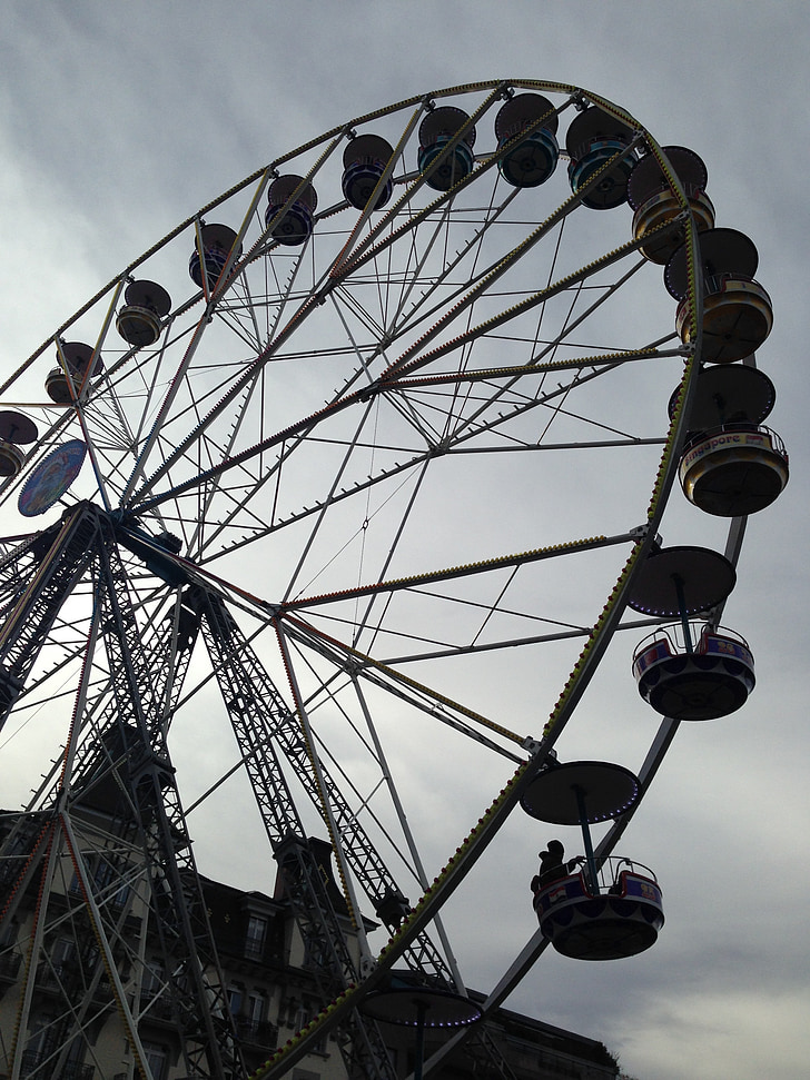amusement park wheel, dramatic, overcast