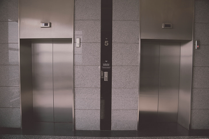 elevator, a beautiful view, building, door, within, indoors, modern