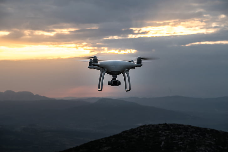white, quadcopter, flying, mountain, valley, highland, landscape