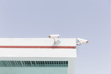 two, white, cctv, cameras, mounted, roof, edge